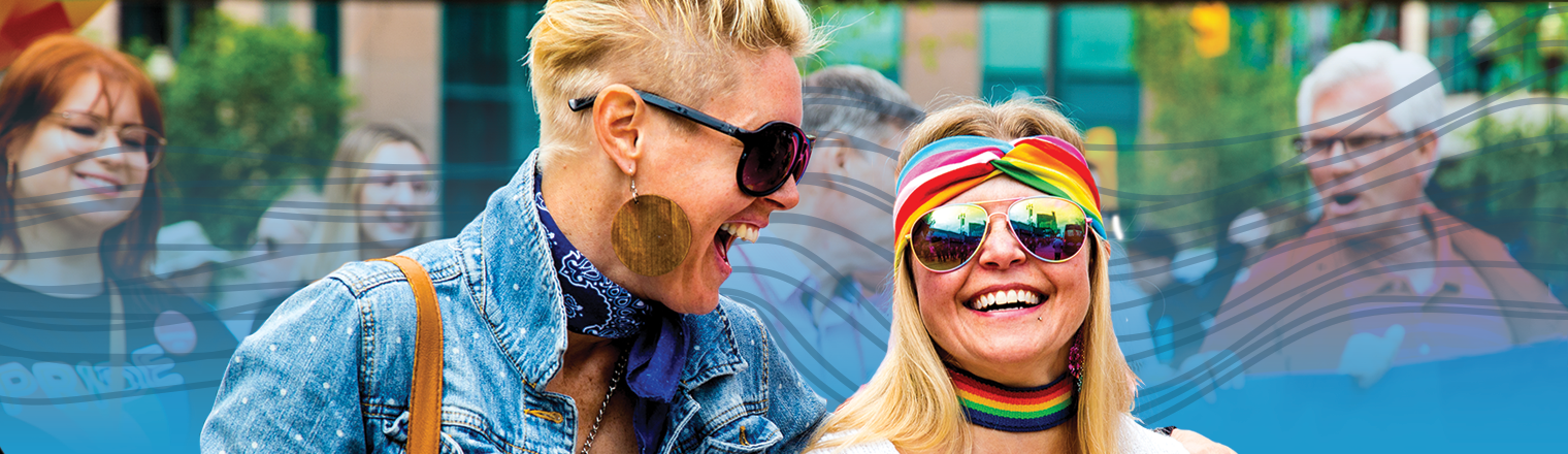 Two people at the Pride Parade. Blue gradient and spectrum are applied behind them