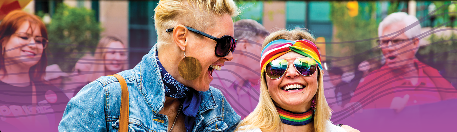 Two people at the Pride Parade. Purple gradient and spectrum are applied behind them
