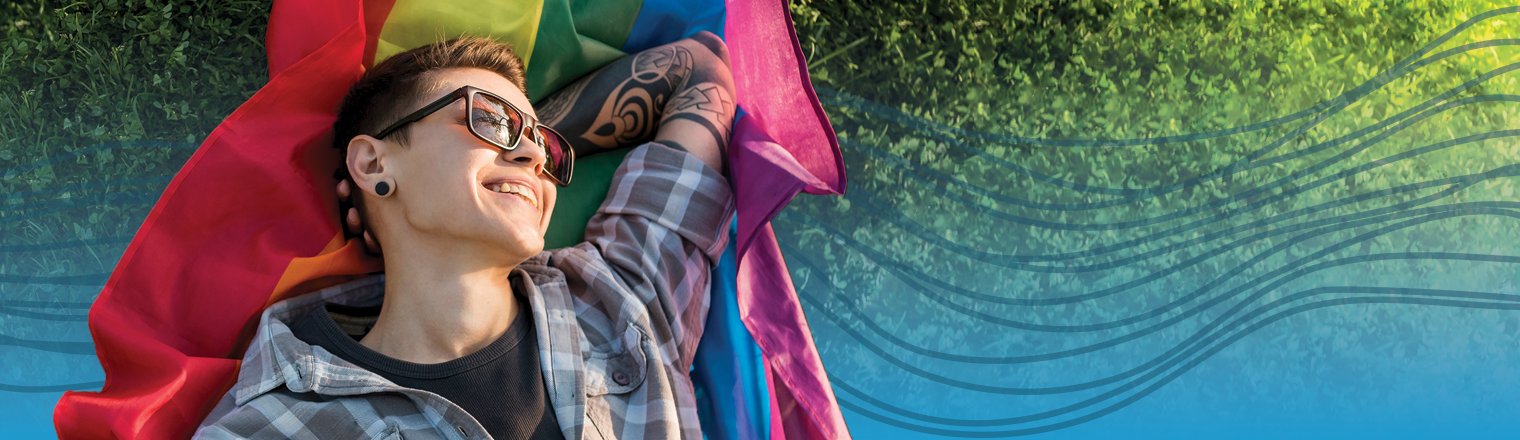 Person at the Pride Festival. Blue gradient and spectrum are applied behind them